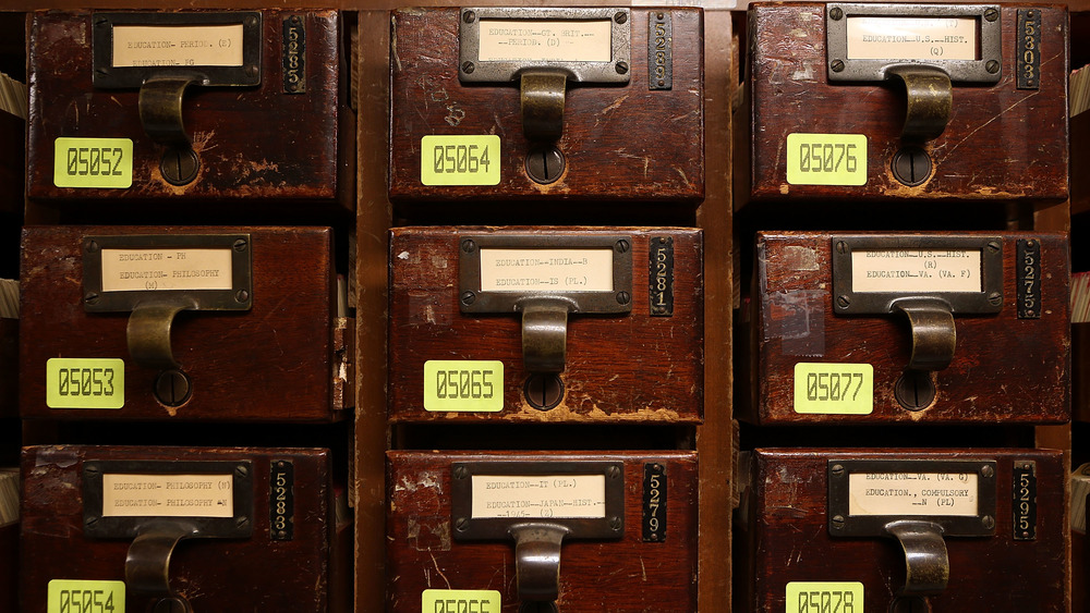 Drawers carry the paper card catalog