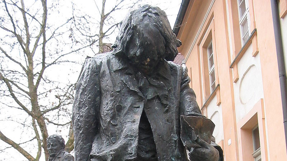 Kaspar Hauser Statue with head bent