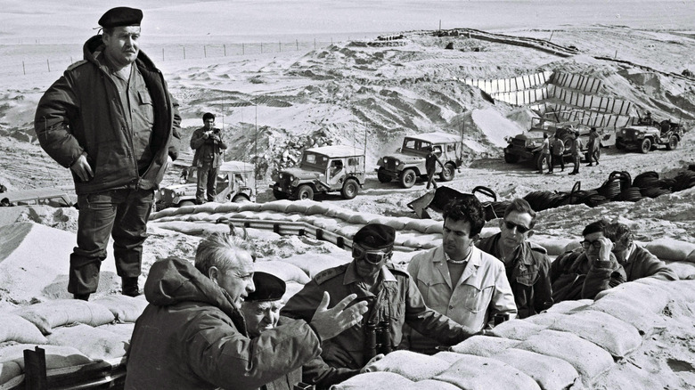 Israeli Prime Minister in a trench near the Suez Canal