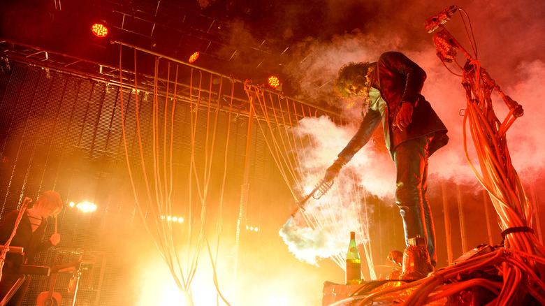 Wayne Coyne lighting stage on fire