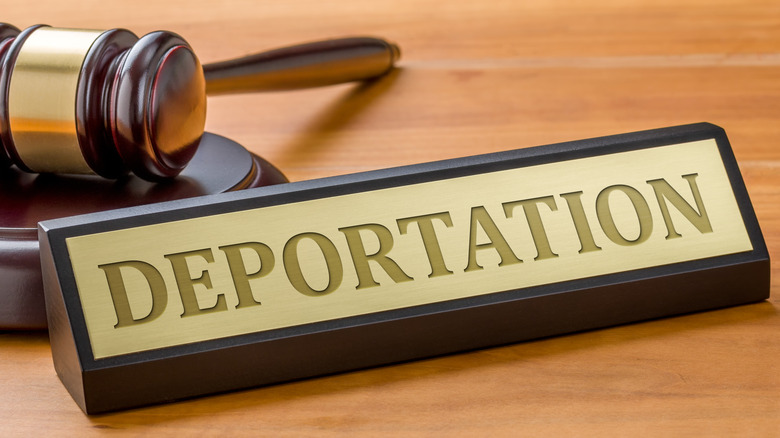 Deportation signage and gavel 