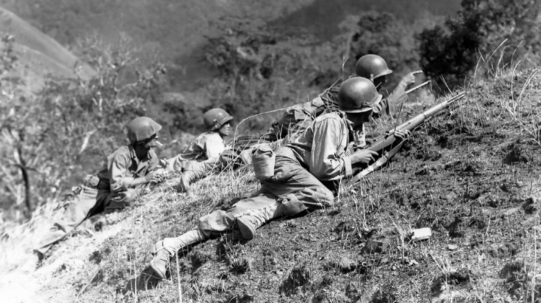soldiers lying on hill