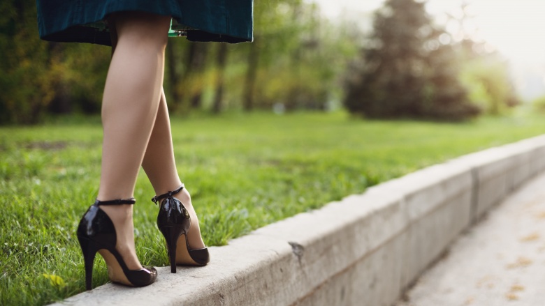 high heels walking on curb