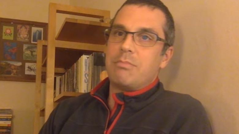 Miguel Mendonca wearing eyeglasses