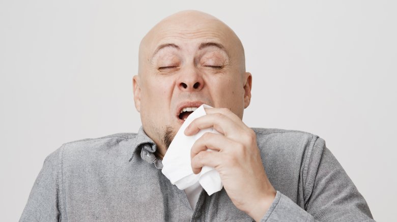 Man with tissue