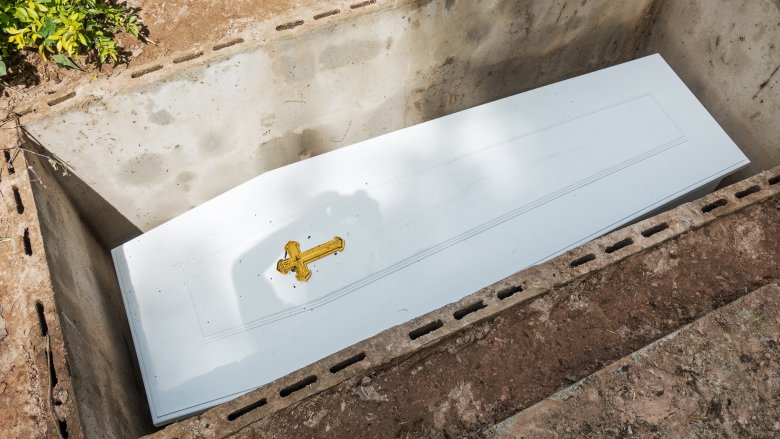 coffin in grave