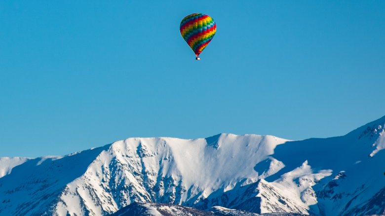 Hot air balloon over alps