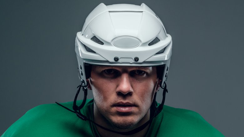 Hockey player with helmet
