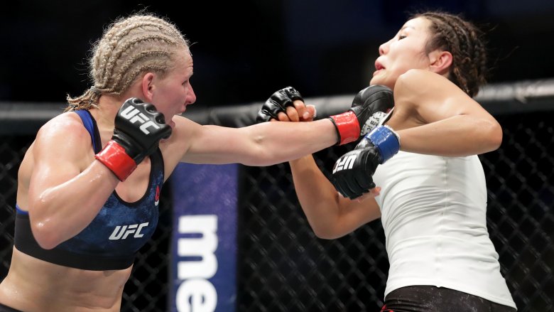 UFC fighter Justine Kish grabs opponent