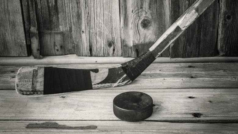 hockey stick and puck