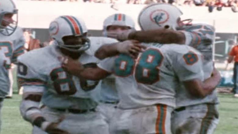 Members of the 1972 Dolphins celebrating