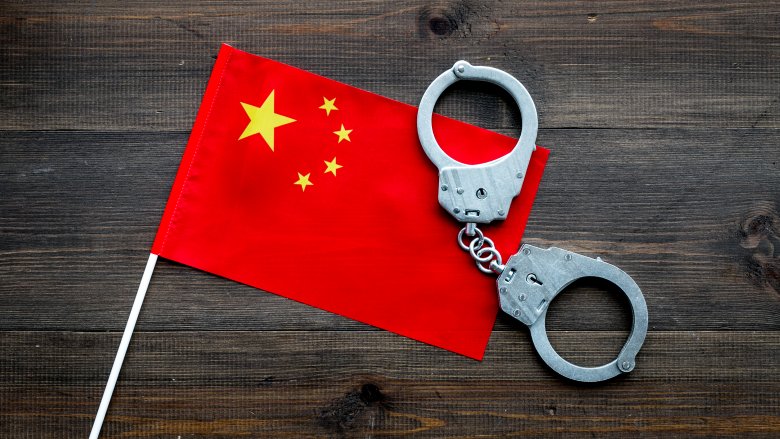 Chinese flag, handcuffs