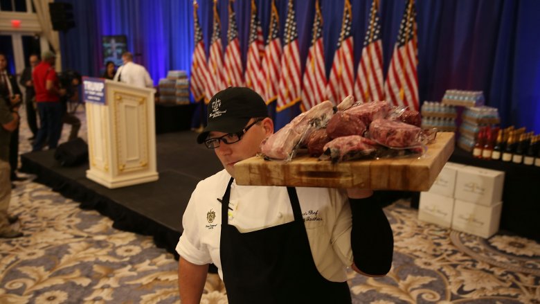 trump waiter carries meat unpaid overtime labor