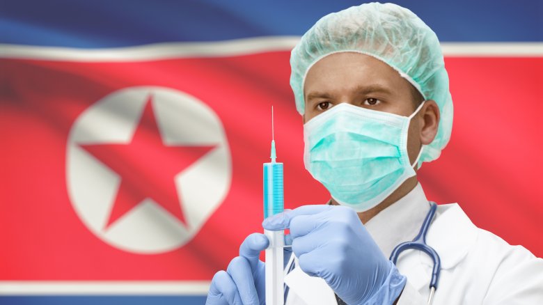 North Korean flag, doctor, shot