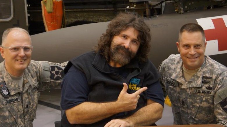 Mick Foley with army troops