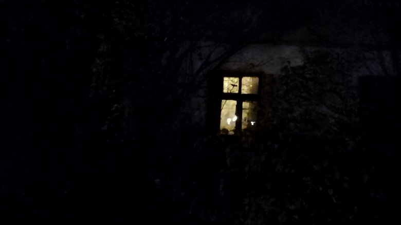 lighted window in dark