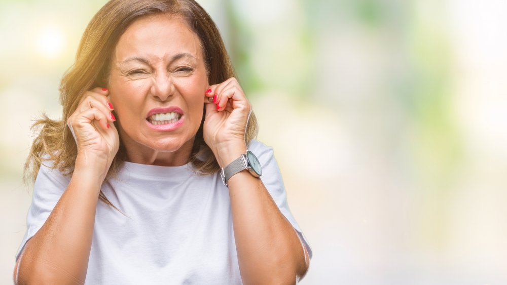 Loud Noise, Woman Covering Ears