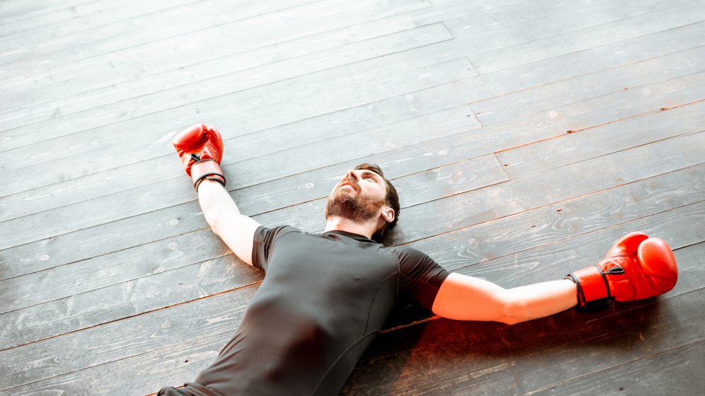 Man on the floor after boxing match