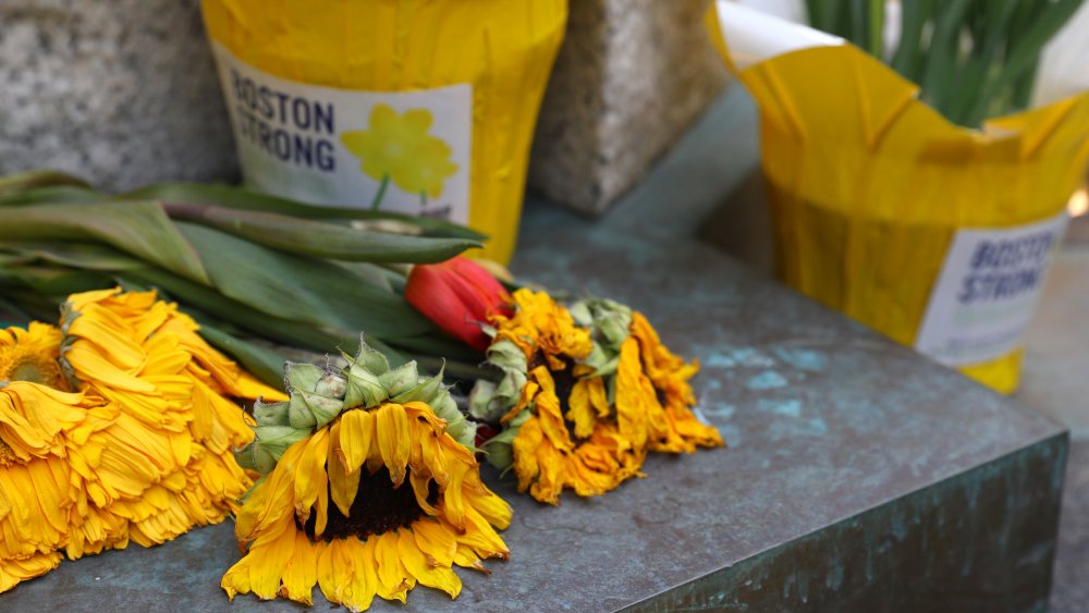 Flowers placed at memorial to the victims of the Boston Marathon bombings.