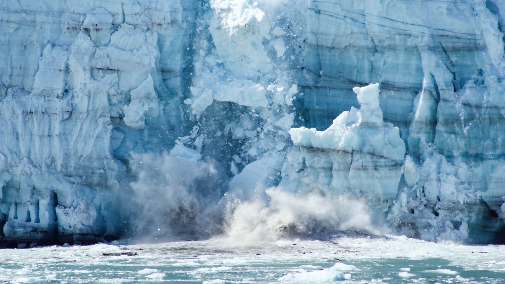Alaskan glacier crashing into the ocean