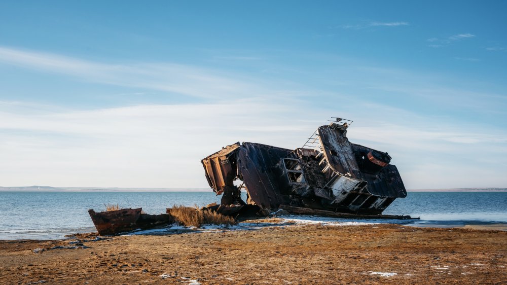 Ship remains on shore of Aral sea or Aral lake, Kazakhstan