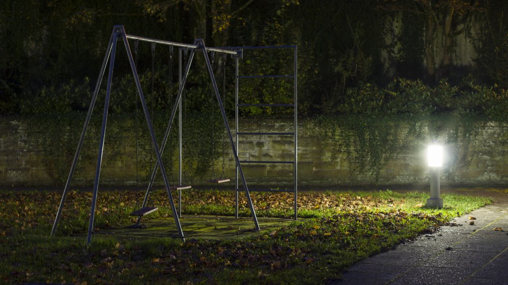 Empty playground at night