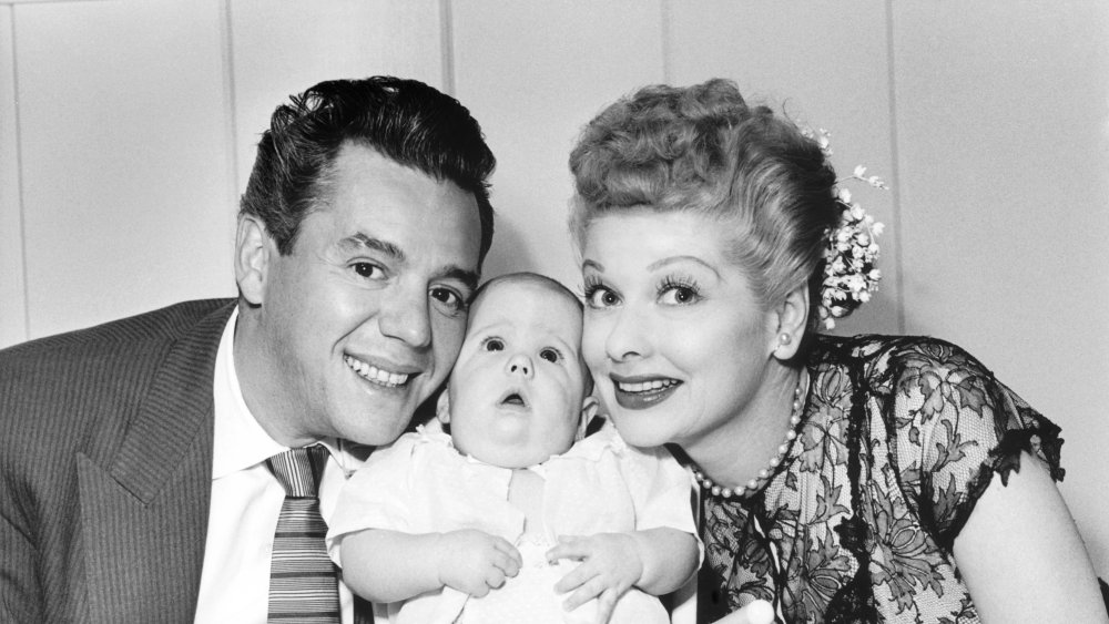 Desi Arnaz Sr., Arnaz Jr. (baby), and Lucille Ball