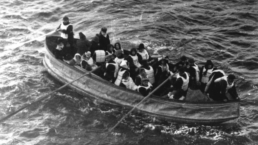 A photograph of a lifeboat full of survivors of the Titanic disaster.