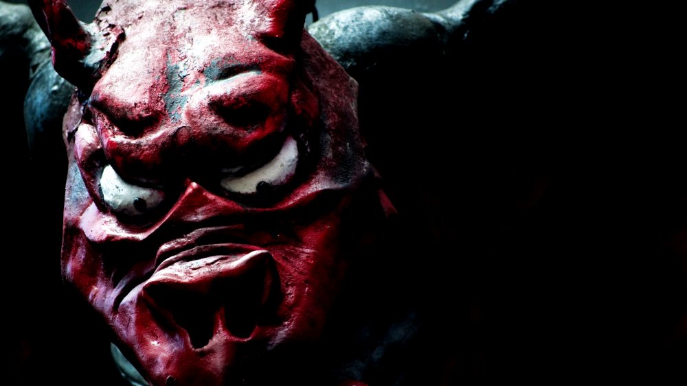 Red devil sculpture