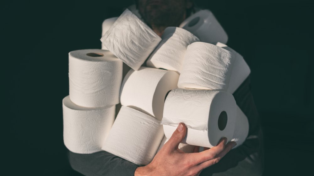 Man hoarding toilet paper