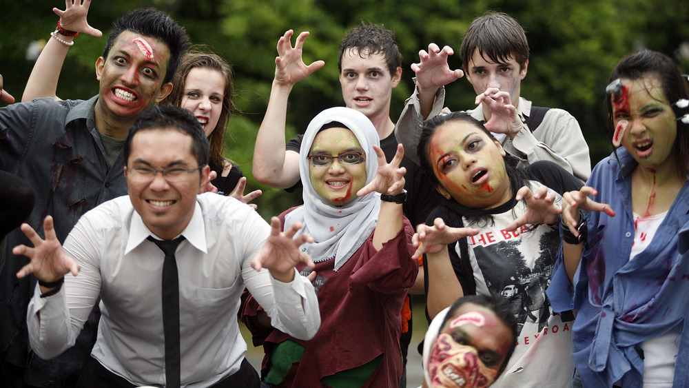 Malaysian fans dressed as zombies during Thrill the World 2010