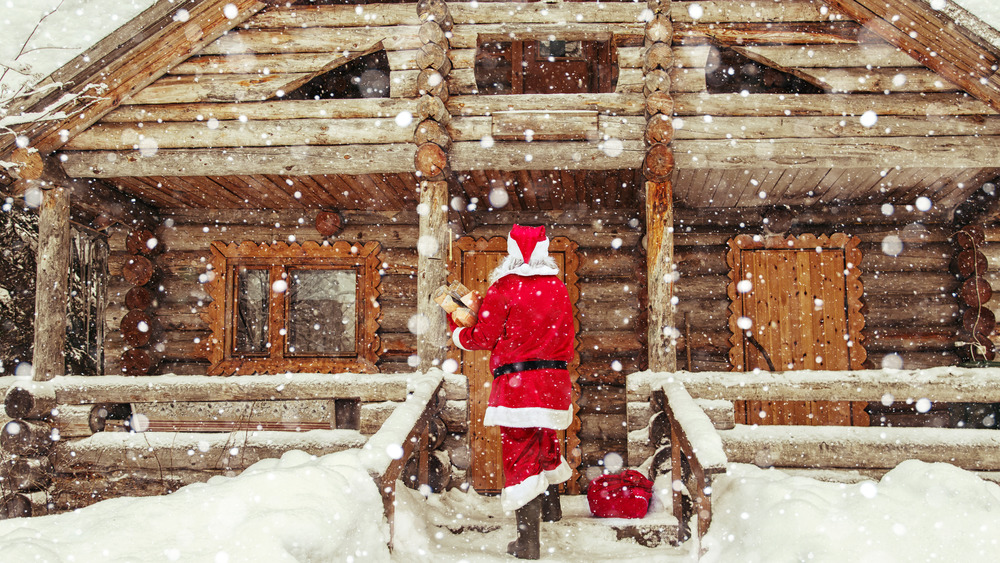 Santa at log cabin 