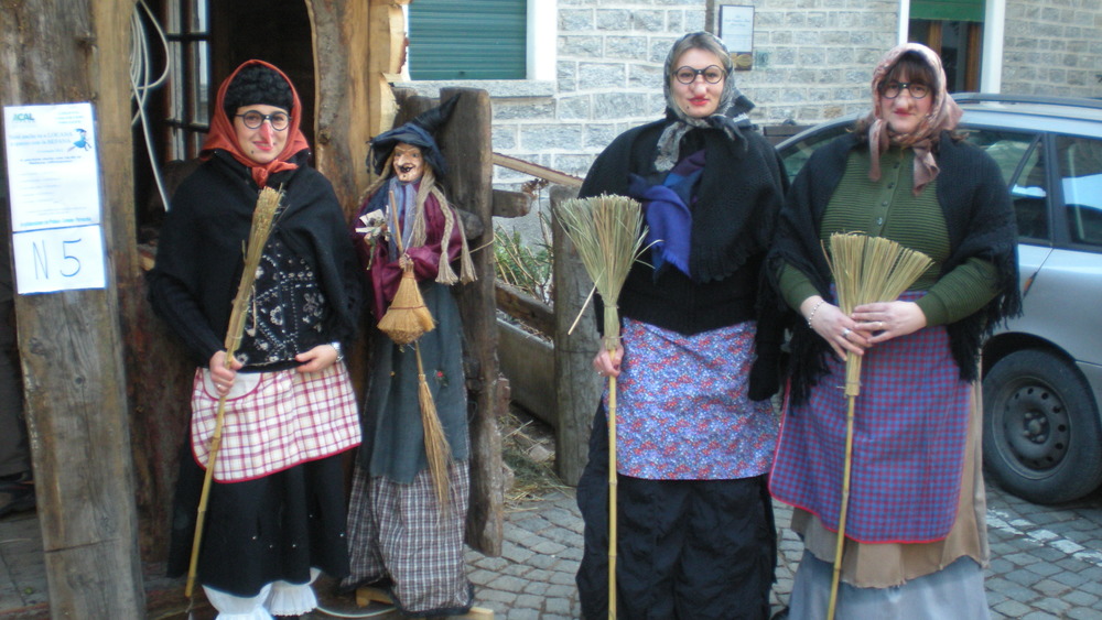 Three women dressed as La Befana, 2012