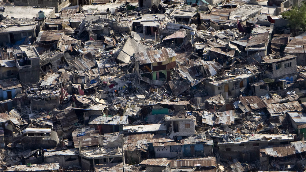 JANUARY 13: In this handout image provided by the United Nations, a poor neighbourhood shows the damage after an earthquake measuring 7.0 rocked the Haitian capital just before 5 pm yesterday, on January 13, 2010 in Port-au-Prince, Haiti. 