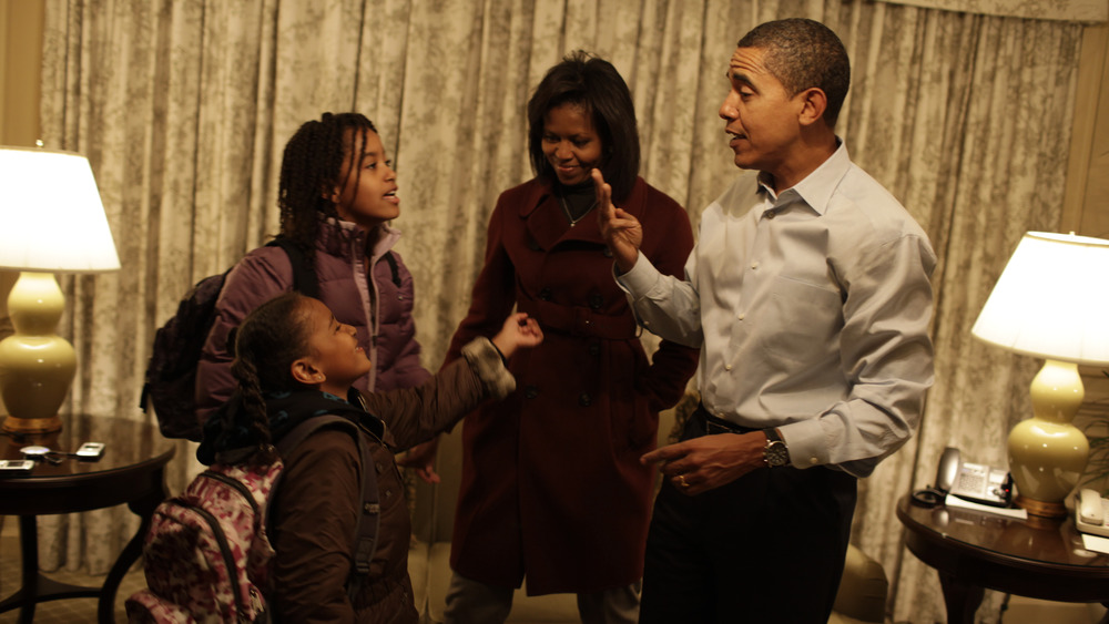 Barack Obama, Michelle Obama and daughters Sasha (7) and Malia (10) at the Hay Adams Hotel in Washington, DC, getting ready for the first day of school.