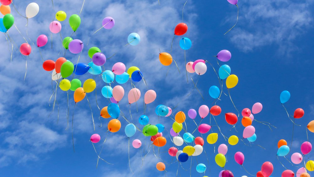 Picture of balloons being released into the air.
