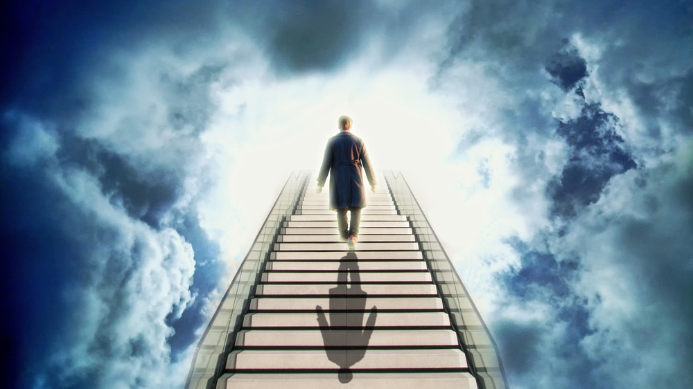Man ascending stairway to Heaven