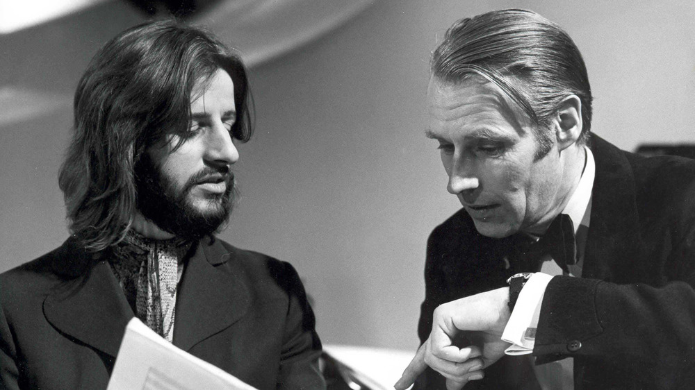 Ringo Starr talking to George Martin