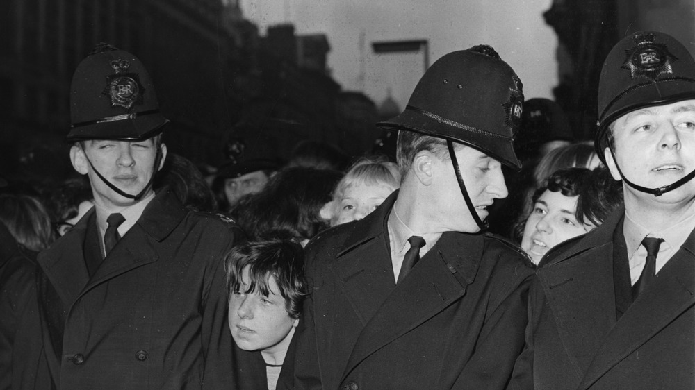 British police with Beatles fans