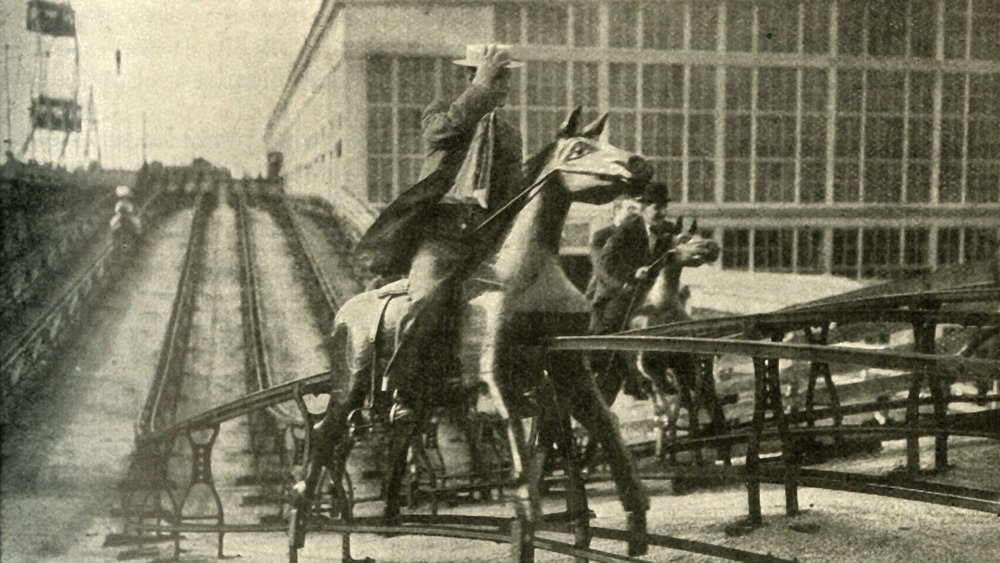 Men riding Steeplechase Horses on Coney Island