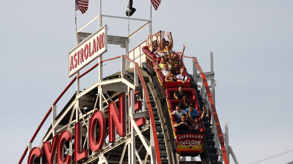 People riding Coney Island's Cyclone roller coaster