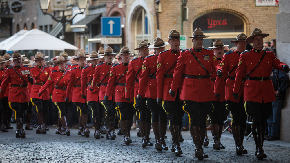  Royal Canadian Mounted Police parade ahead of the playing of the Last Post at the Menin Gate Memorial to the Missing on April 6, 2017