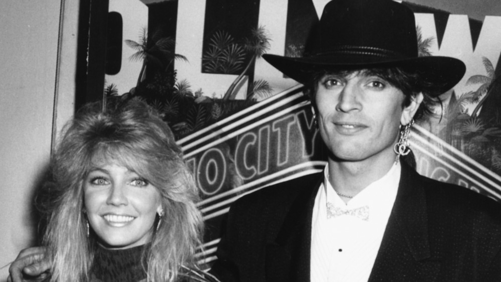 Heather Locklear and Tommy Lee smiling, 1989