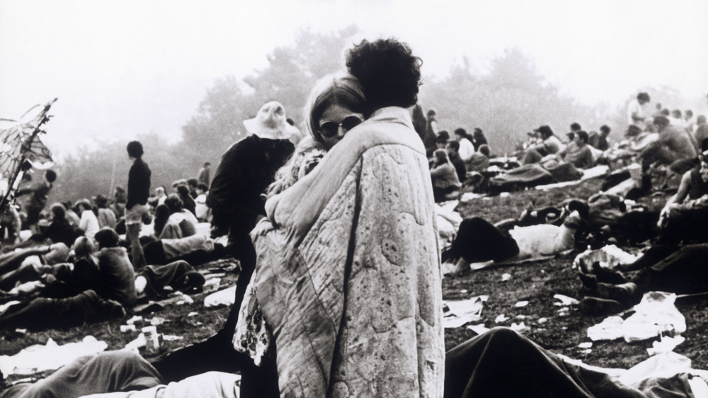 Woodstock couple wrapped in blanket
