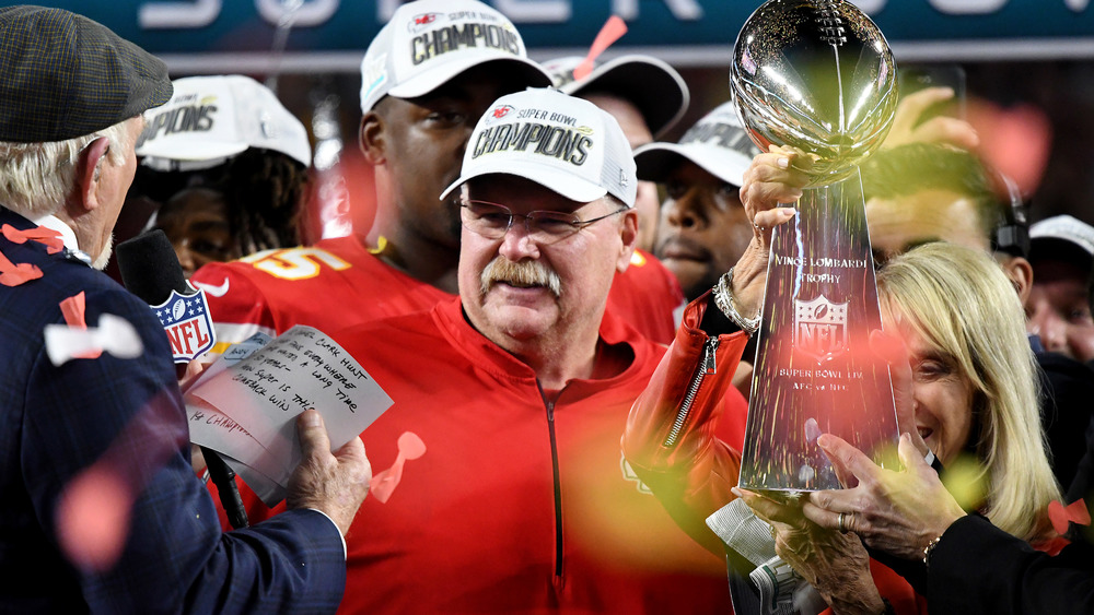 Reid with Super Bowl LIV trophy