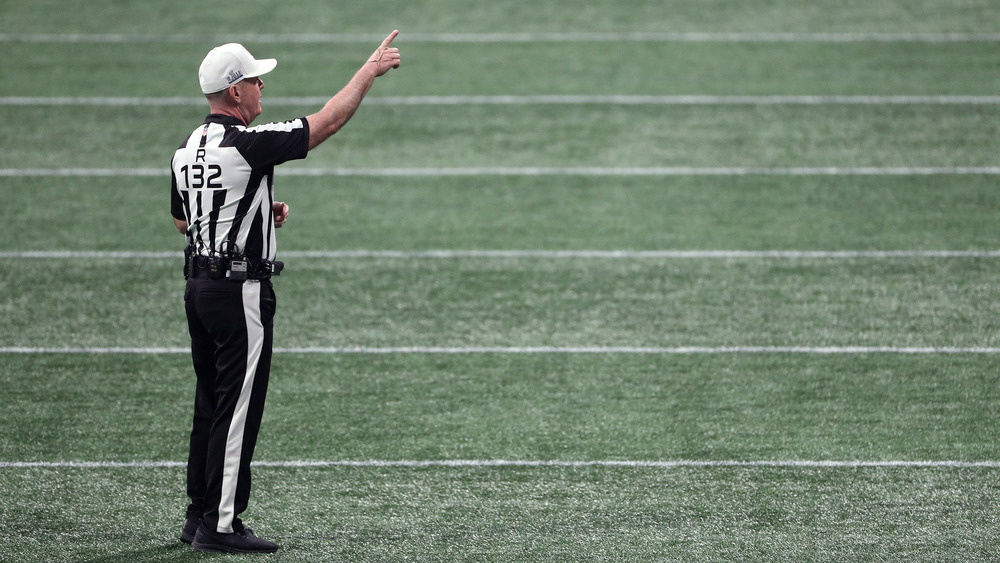 Football referee makes a call