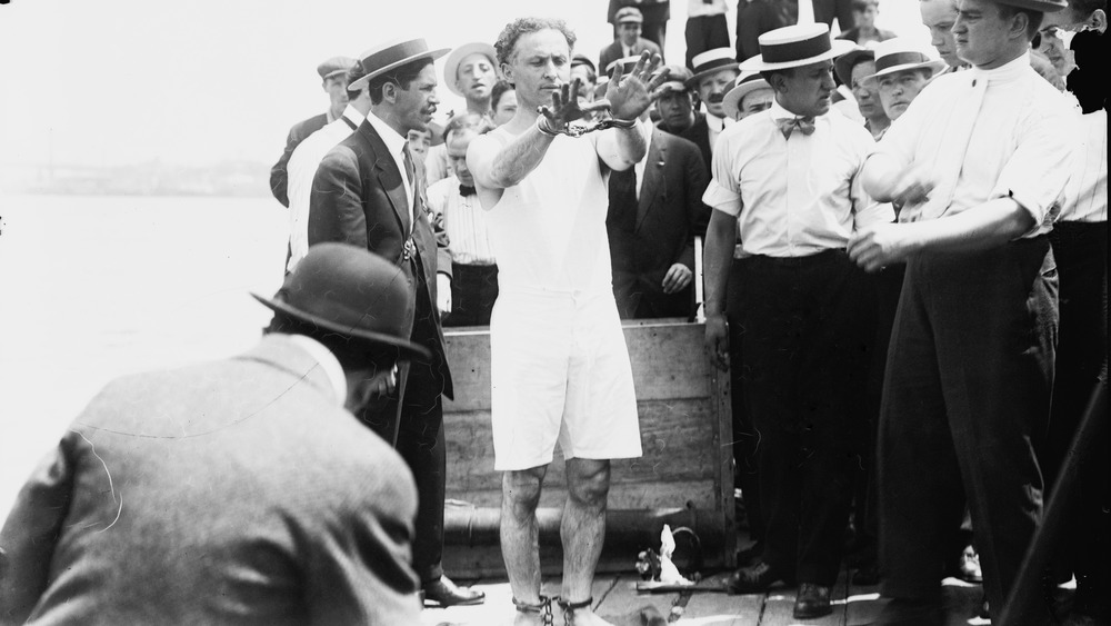 Harry Houdini performs