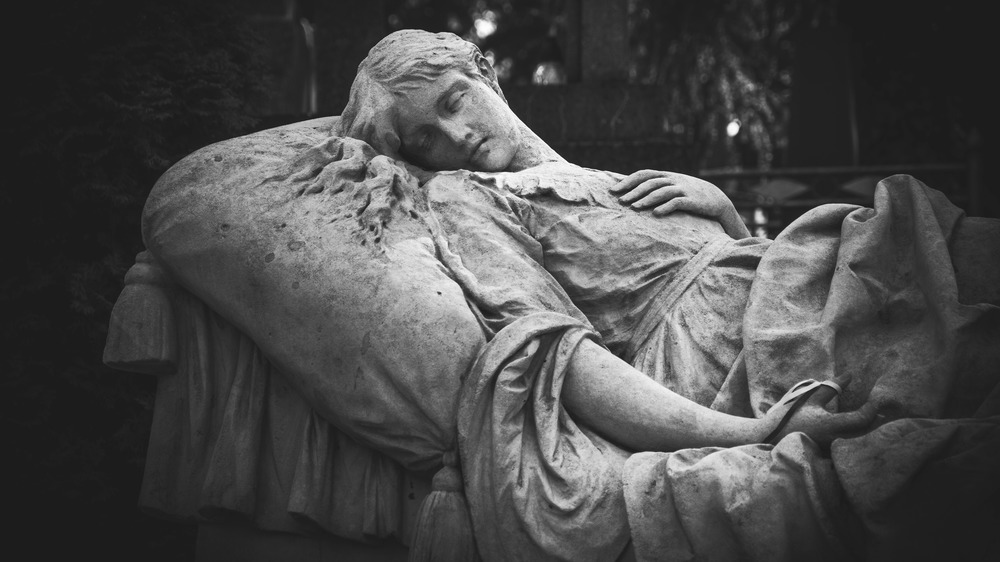 A statue in a graveyard