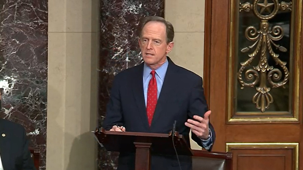 Patrick Toomey at podium speaking 