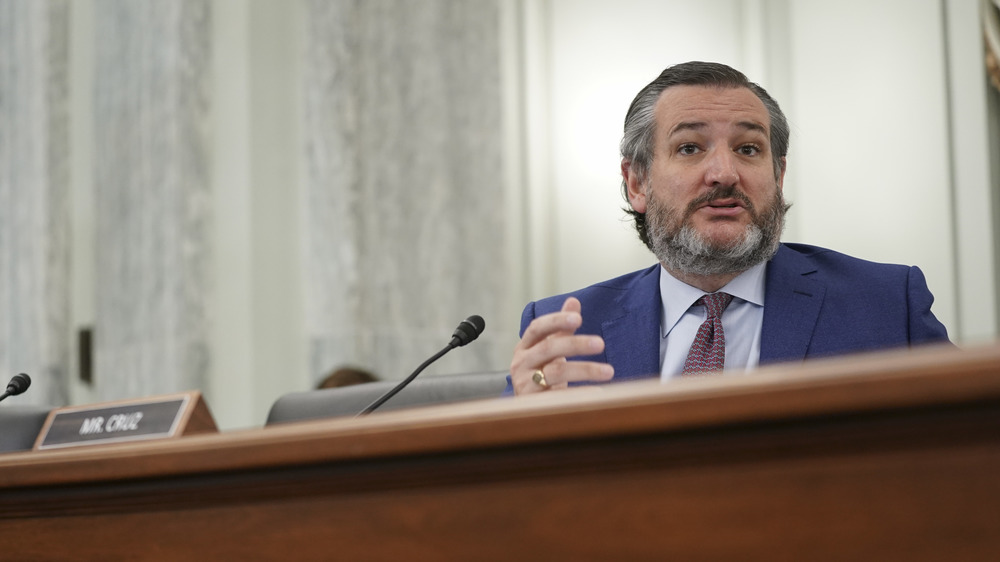 Ted Cruz speaking behind desk